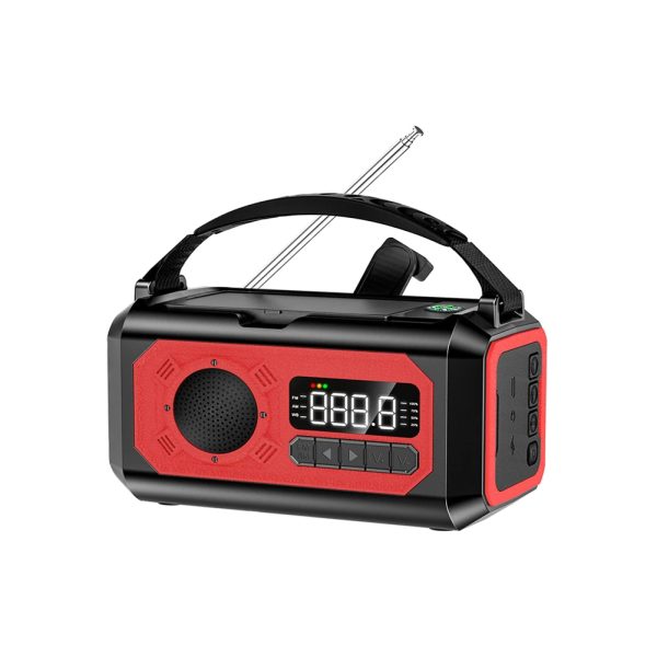 The Emergency Solar Hand Crank Radio - 12000mAhA Battery is a portable black and red device with a digital display, control buttons, speaker, handle, and extended antenna, shown on a white background. | outdoorsurvivors.com